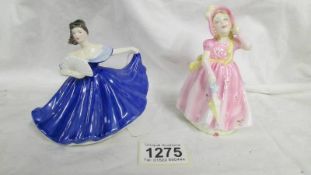 Two small Royal Doulton figurines - Babie HN2121 and Elaine HN3214.