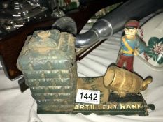 A cast iron 'artillery' mechanical money box.