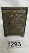 A Victorian cast iron safe money box.