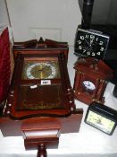 A wall clock and three mantel clocks. (Collect only).