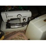 A Lamain super deluxe electric sewing machine,. (Collect only)
