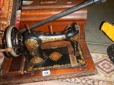 A vintage Jones sewing machine. (Collect only)