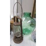 A glass carbide and a hurricane lamp. (Collect only)