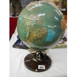 A Globe of the world with raised countries. (Collect only)