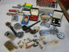 A mixed lot of jewellery, lighter, etc.,