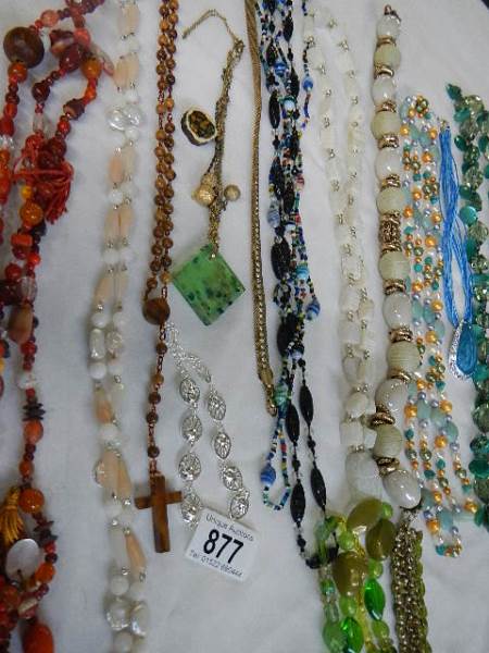 A mixed lot of assorted coloured necklaces. - Image 4 of 4
