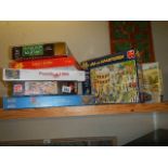 A mixed lot of jigsaw puzzles.