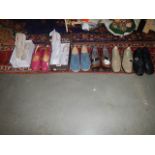 Seven pairs of new ladies shoes.