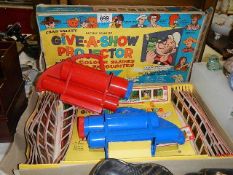 A 'Give A Show' projector (Popeye).