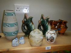 A mixed lot including fish vases, lustre jugs. (Collect only).