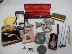 A mixed lot including badges, cuff links, hat pins etc.,
