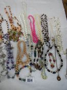 A mixed lot of coloured stone and bead necklaces.