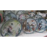 Six Japanese Geisha plates.