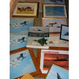 A collection of framed and glazed aircraft prints, books etc., (Collect only)