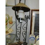 A hanging lamp and other ironwork. (Collect only)