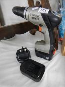 A Black and Decker cordless drill.