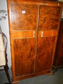 A two door walnut veneer tall boy. (collect only)