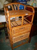 A bamboo and wicker stand with 2 drawers, (collect only).