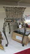 A good quality basket weave drinks stand on metal base with removable basket. (Collect only)