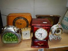 Six assorted clocks.