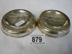 Two silver dishes, 3.5" diameter.