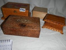 Four old wooden boxes and contents.