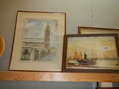 A framed and glazed church scene watercolour and a seascape.