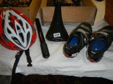 A cycle hat, saddle, pump, shoes etc.,