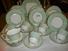 A part Crown Staffordshire tea set with cake plate.