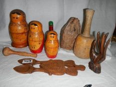 A mixed lot of wooden items including large nut and pair of loving spoons.