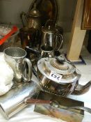 A mixed lot of silver plate teapots etc.,