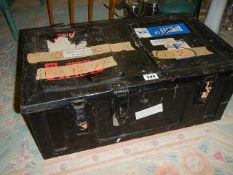 An old heavy duty tin trunk.