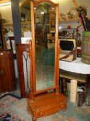 A pine 'Cheval' dressing mirror.