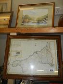 A framed and glazed map of Cornwall and a watercolour signed Kerris.