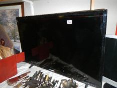A Blaupunkt flat screen television, in working order.