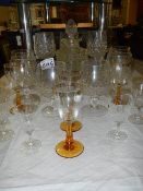 A glass decanter, 6 cut glass drinking glasses and other glasses.