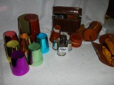 A quantity of leather cased drinking sets, vanity sets etc.,