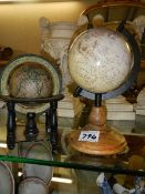 Two world globes.