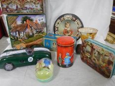 A mixed lot of collectable tins.