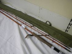 A split cane fishing rod in good condition.