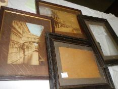 Two pictures and two picture frames.