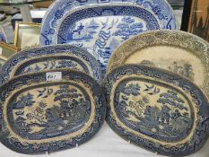 A quantity of blue and white meat platters (some stained).