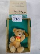 A boxed Steiff smal bear.