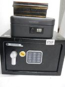 Two safes (locked) and a cash box.