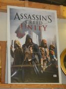 A framed and glazed poster 'Assasin's Creed Unity'.