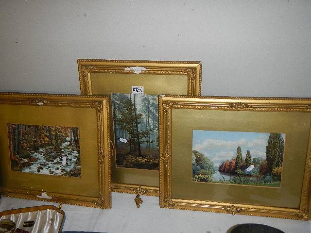 Three framed and glazed rural scenes.