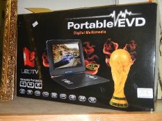 A new boxed 15" portable LED television, model JC-1505.