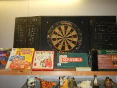 A dart board and other games.