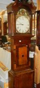 A 30 hour Grandfather clock in working order.