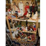 A quantity of Dolls of the World and other costume dolls.